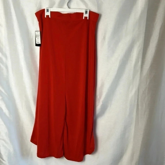 BRIGHT RED straight hi low skirt with a bit of  flare at the bottom MAGAZINE NWT - Picture 5 of 10
